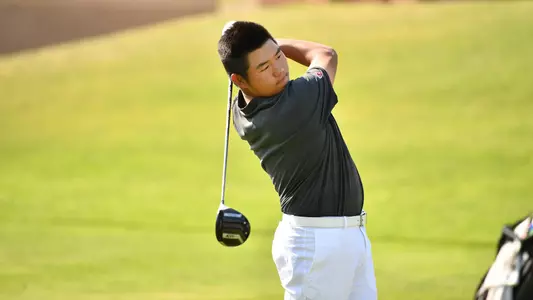 Io Palmer with students and environmental portrait in Ceramics studio