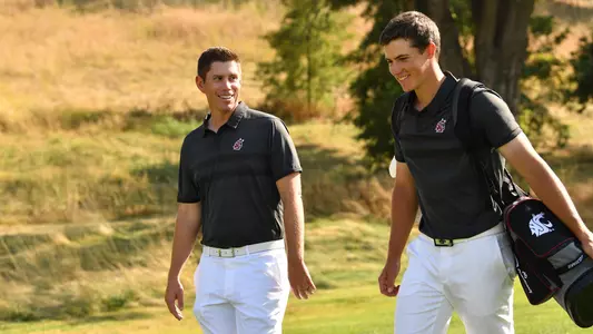 Io Palmer with students and environmental portrait in Ceramics studio