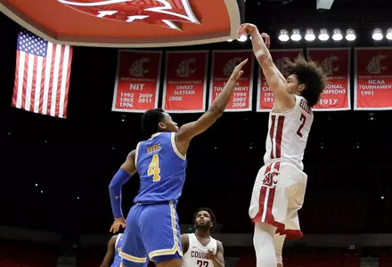 Washington State forward CJ Elleby (2) shoots over UCLA guard Jaylen Hands (4) during the second half of an NCAA college basketball game in Pullman, Wash., Wednesday, Jan. 30, 2019. UCLA won 87-67. (AP Photo/Young Kwak)