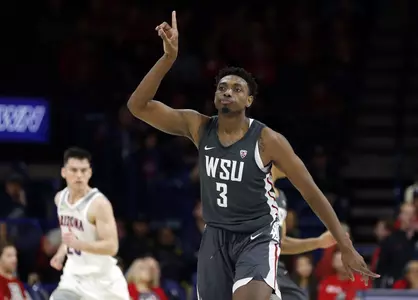 Washington State forward Robert Franks gestures after scoring a basket against Arizona during the second half of an NCAA college basketball game Saturday, Feb. 9, 2019, in Tucson, Ariz. Washington State won 69-55. (AP Photo/Rick Scuteri)