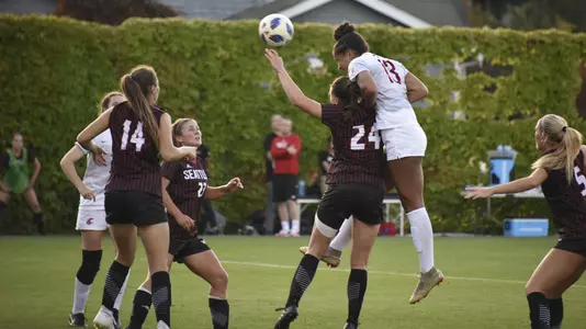 Elyse Bennett with the header at Seattle U
