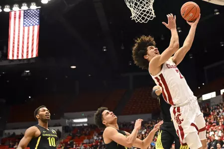Washington State forward CJ Elleby, right, drives to the basket as Oregon forward Chandler Lawson, guard Will Richardson and forward Shakur Juiston watch during the first half of an NCAA college basketball game Thursday, Jan. 16, 2020, in Pullman, Wash. (AP Photo/Pete Caster)