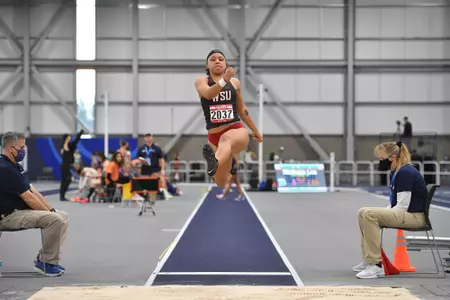 Anna Rodgers in the long jump event at the Cougar Classic Invitational
