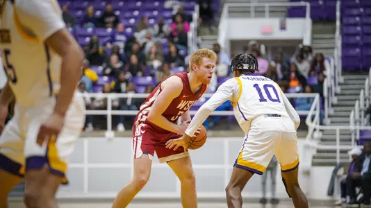 Mullins surveys the court against Prairie View A&M