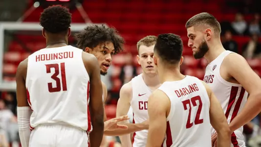 DJ Rodman huddles the Cougars