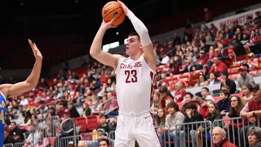 Andrej Jakimovski rises for a shot over a UCLA defender