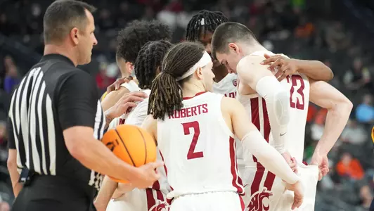 Cougs huddle up on the court against Cal