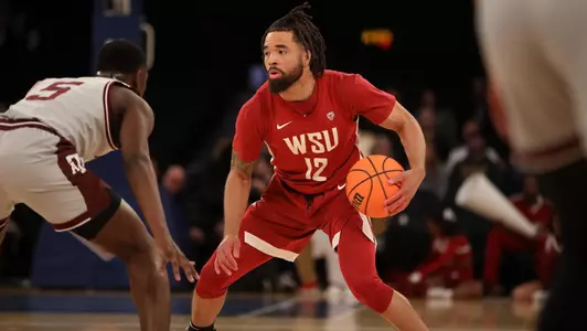Michael Flowers with the dribble against Texas A&M