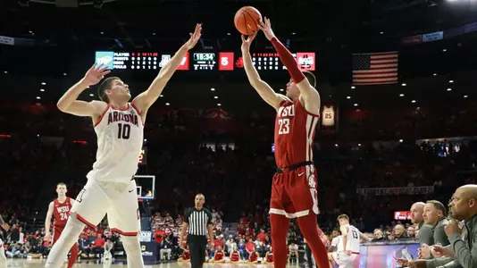 Andrej Jakimovski shoots over an Arizona defender
