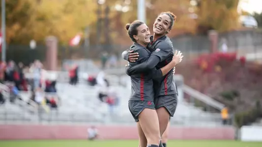 Reagan Kotschau and Margie Detrizio celebrate Kotschau's goal over Utah