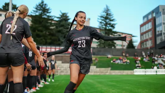 Rajanah Reed high fives her teammates during lineup introductions