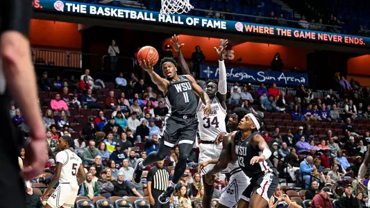 Joseph Yesufu drives for a layup against Mississippi State, Nov. 18, 2023