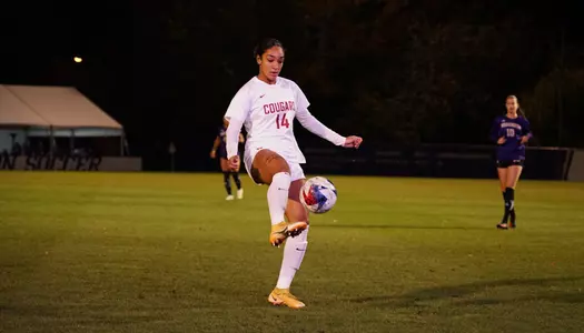 Margie traps the ball against Washington