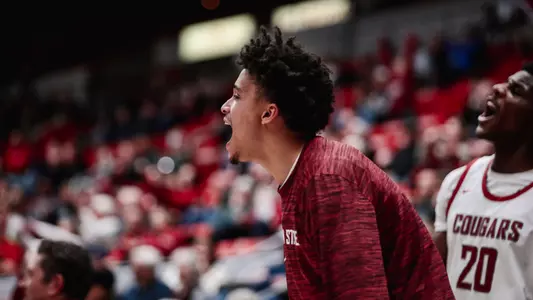 Isaiah Watts celebrates after a made basket against Eastern Washington, Nov. 27, 2023