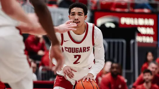 Myles Rice dribbles against Eastern Washington, Nov. 27, 2023