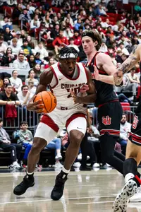 Rueben Chinyelu works in the post against Utah, Jan. 24, 2024