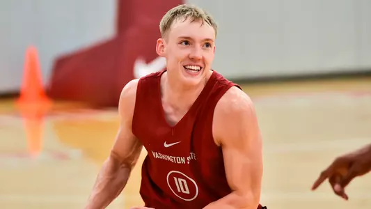 Parker Gerrits dribbles in a drill during practice