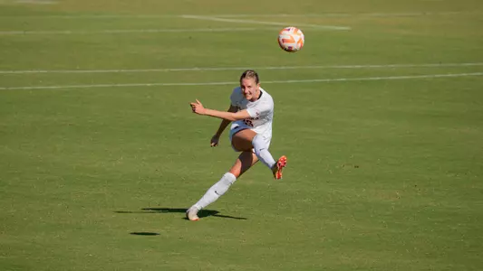 Jenna Studer clears the ball at No. 13 Pepperdine, Oct. 2, 2024