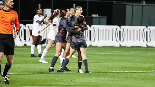 Grayson Lynch celebrates with teammates after scoring, Oct. 9, 2024