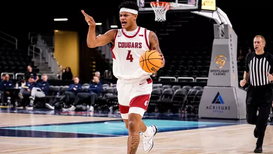 LeJuan Watts dribbles up the court against Fresno State, Nov. 26, 2024