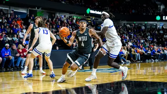 LeJuan Watts drives against Boise State, Dec. 7, 2024