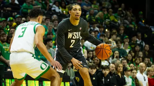 Myles Rice dribbles against Oregon, Feb. 10, 2024