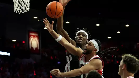 Rueben Chinyelu rises to block a shot against Arizona, Feb. 22, 2024