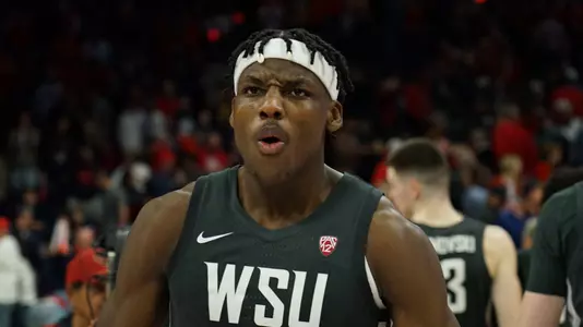 Rueben Chinyelu celebrates after beating No. 4 Arizona, Feb. 22, 2024