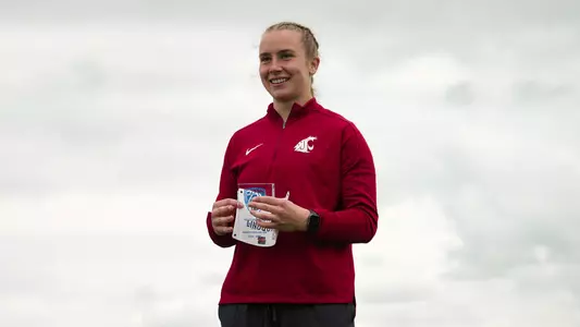 Laura Lindquist stands on the podium as the bronze medalist in the women's javelin throw
