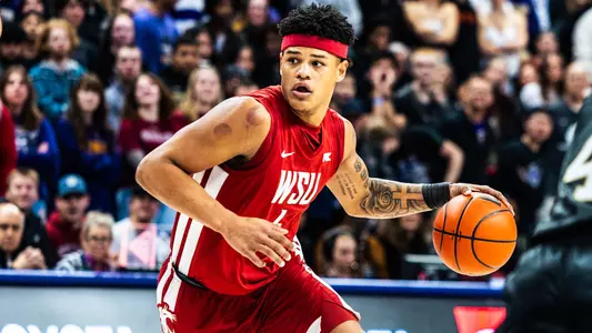 LEJuan Watts dribbles against Washington, Dec. 18, 2024