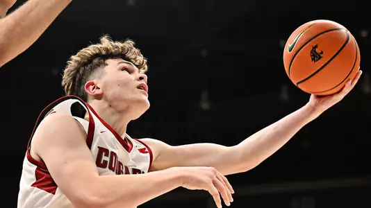 Tomas Thrastarson finishes the reverse layup against St. Thomas