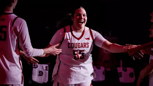 25_12_12 Malia Ruud runs out during starting lineups against Texas Tech