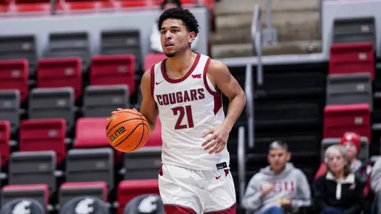 Ace Glass brings the ball up the court against Mercer, December 20, 2025