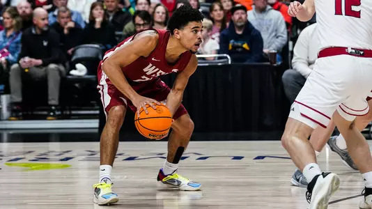 Ace Glass surveys the court against Eastern Washington, Dec. 17, 2025