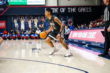 LeJuan Watts dribbles against Saint Mary's, Feb. 15, 2025