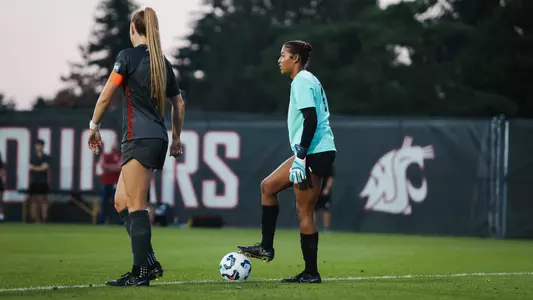 Nadia Cooper and Reese Tappan survey the field against UC Irvine