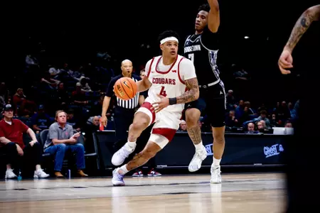 LeJuan Watts drives against Georgetown, March 31, 2025