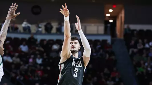 Ethan Price shoots over his SF defender, March 9, 2025