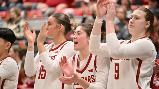 26_1_8 WSU WBB Bench celebrates in Beasley in a game against Oregon State