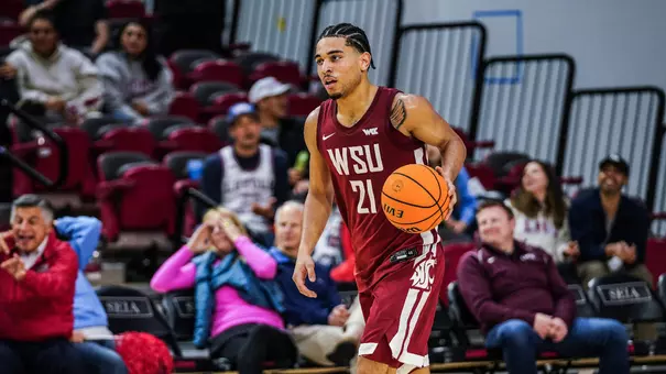 Ace Glass brings the ball up the court against LMU, Feb. 25, 2026