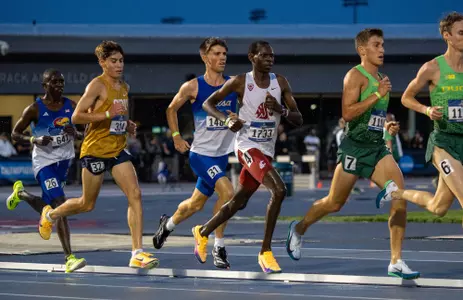 Evans Kurui runs with the lead pack at the start of the men's 10,000-meter run at the NCAA West First Roudns