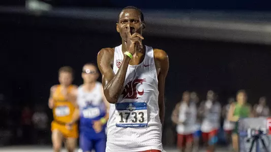 Evans Kurui celebrates after qualifying in the 10k Wednesday at the NCAA West First Rounds