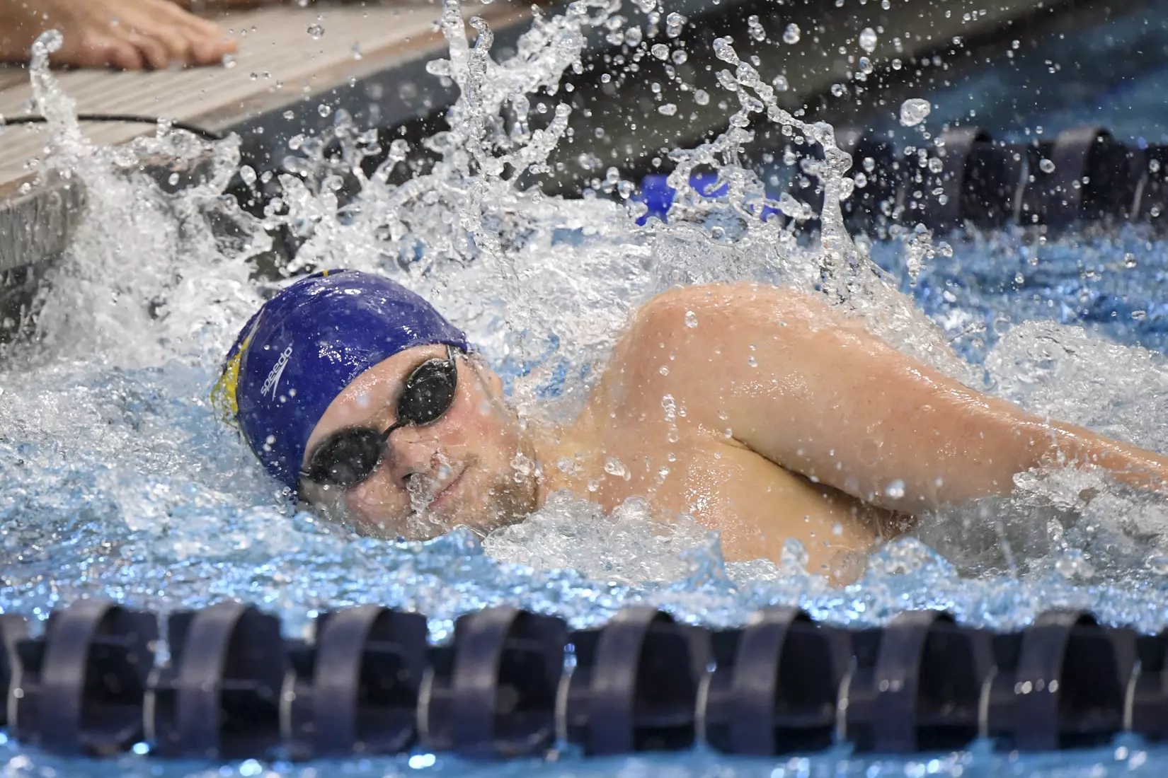 Sam Neaveill finishes the anchor leg of the 400 Free Relay.