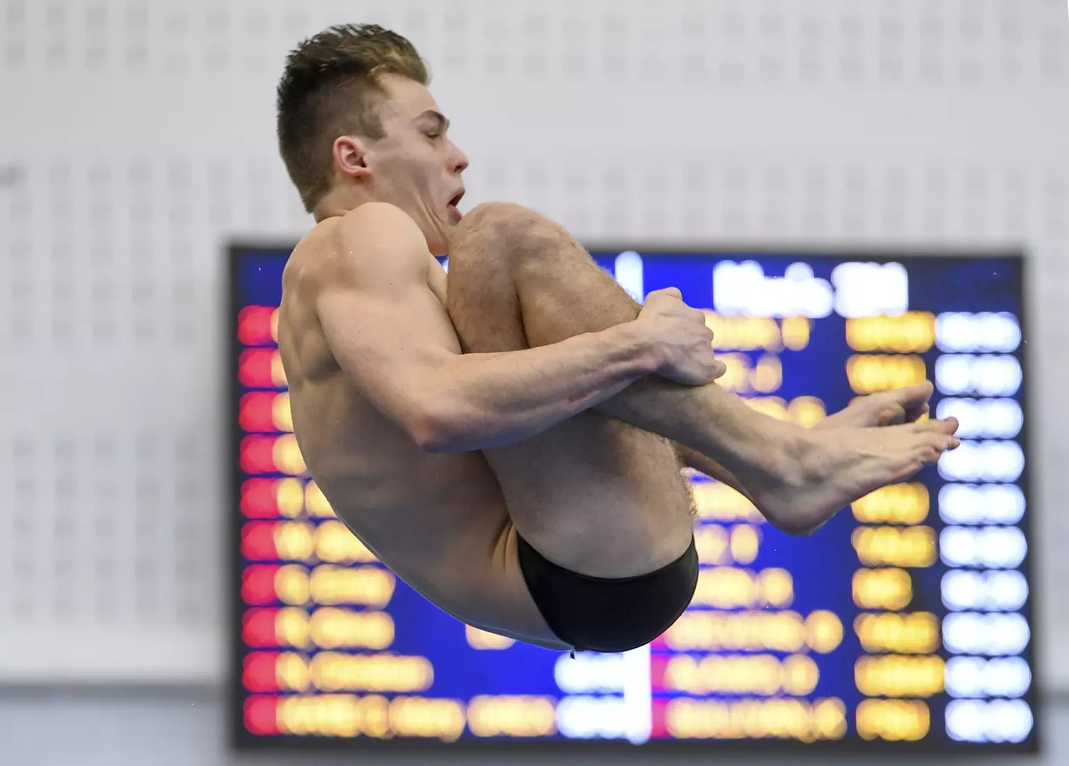 PJ Lenz dives in the three meter event.