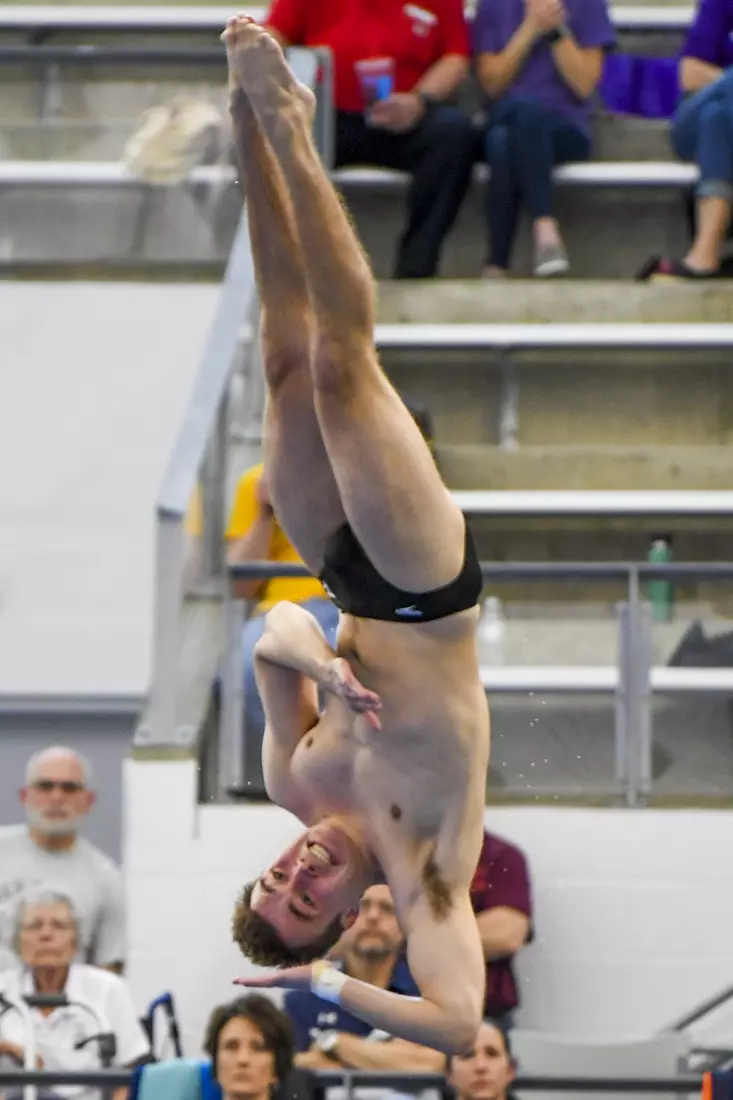 Nick Cover dives in the three meter event.