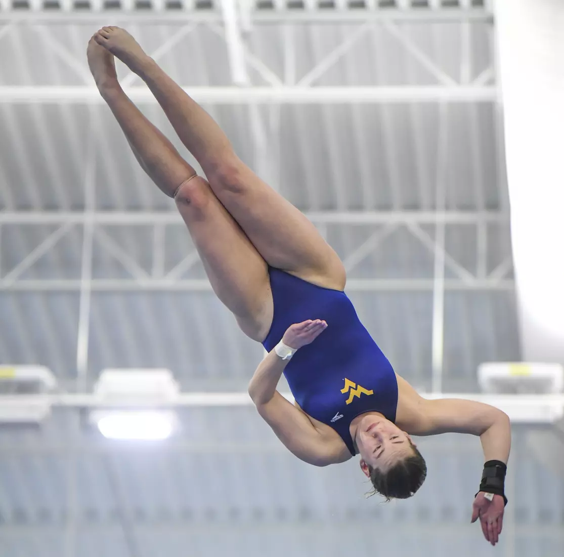 Holly Darling competes in the NCAA Zone platform diving competition.