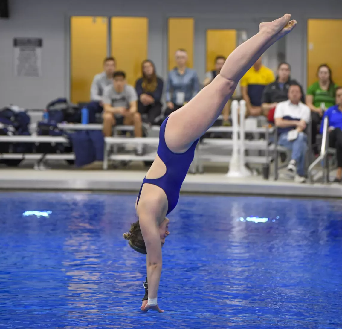 Holly Darling competes in the NCAA Zone platform diving competition.