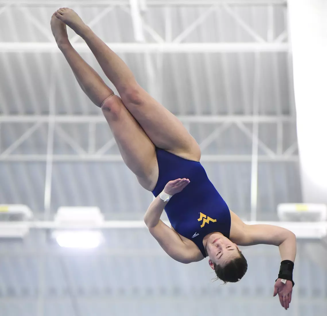 Holly Darling competes in the NCAA Zone platform diving competition.