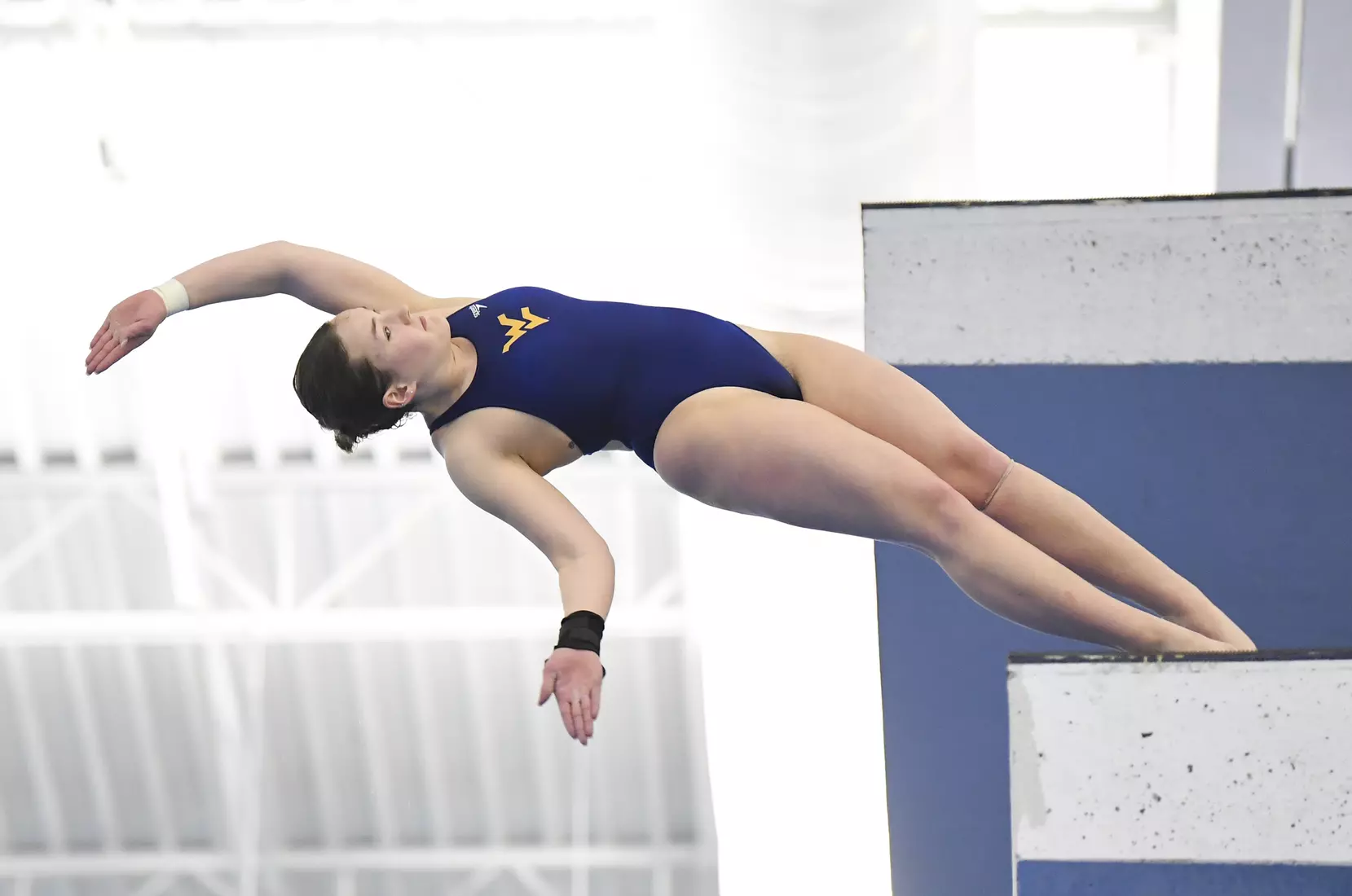 Holly Darling competes in the NCAA Zone platform diving competition.