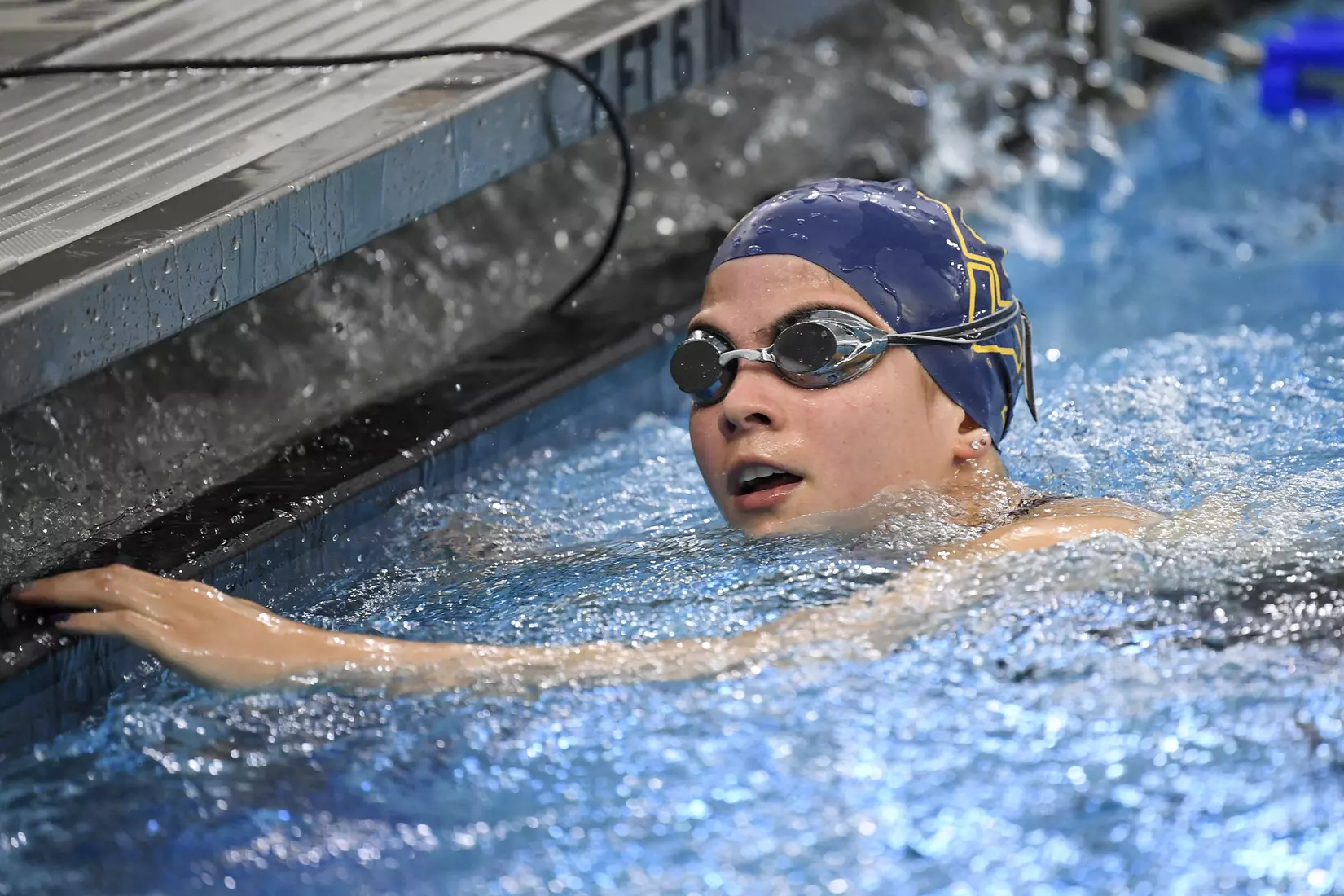 Julia Nilton finishes the 50 meter freestyle.